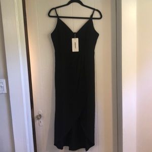 Beautiful black wrap dress. New with tags!